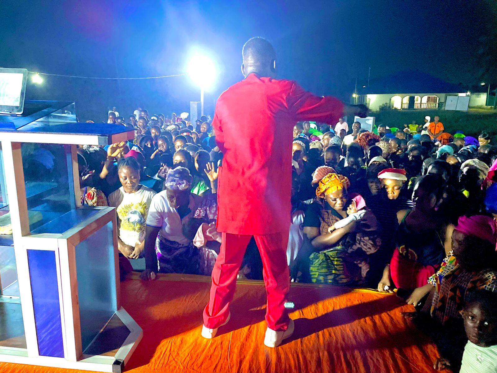 Prayer and response during a crusade meeting